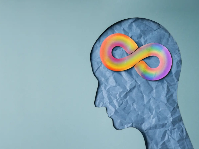 Formation TDAH et troubles du neurodéveloppement représentés par le symbole de la neurodiversité